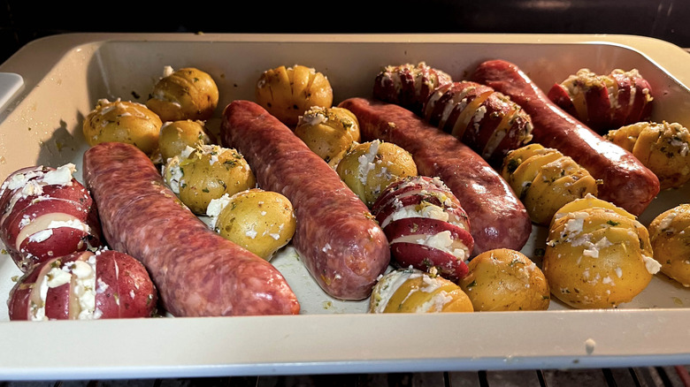 sausages and potatoes in a pan