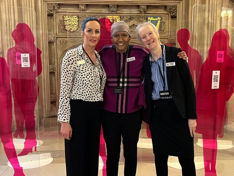 Asha Umrwasingh, center, with two companions of the second cancer patient at Parliament House.  Lemma Shehadi / National