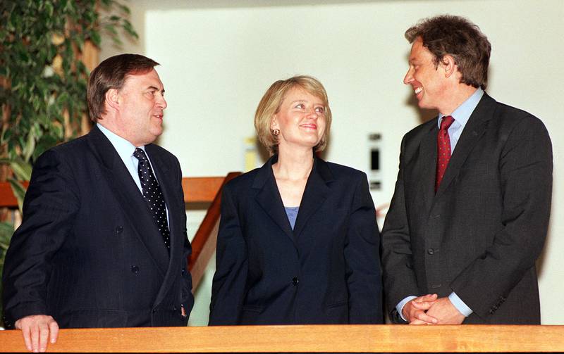 Then prime minister Tony Blair, right, and deputy prime minister John Prescott with Margaret McDonagh in 2004. Getty Images